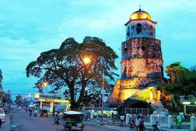 The Belfry Tower in Dumaguete coastal promenade and streetlights - highlights of the City Tour.