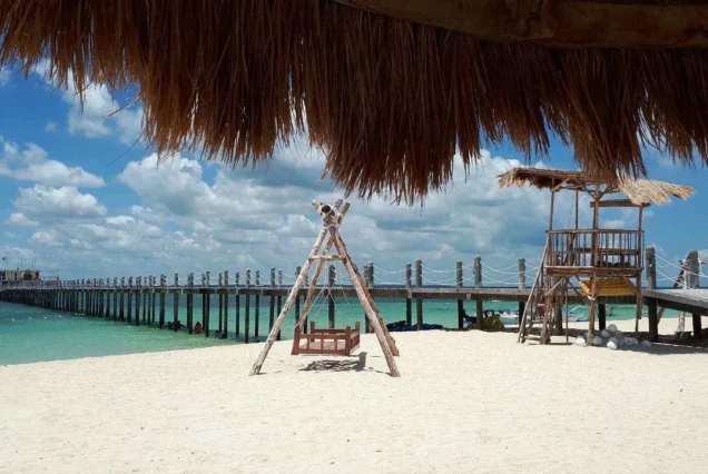 Lakawon Beach Resort on Lakawon Island in Cadiz, Negros Occidental, surrounded by blue waters and tropical scenery.