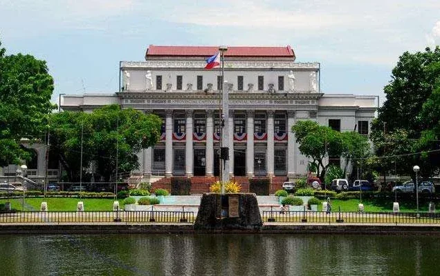 Negros Occidental Provincial Capitol building in Bacolod City, viewed across the Capitol Park and Lagoon.