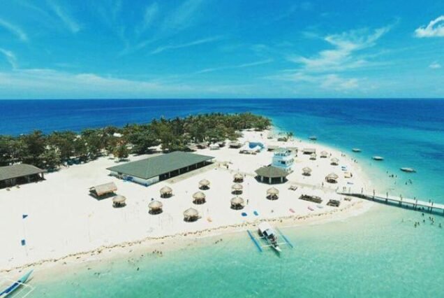 Lakawon Beach Resort in Cadiz, Negros Occidental, featuring a tropical beach, clear waters, and relaxing island scenery.