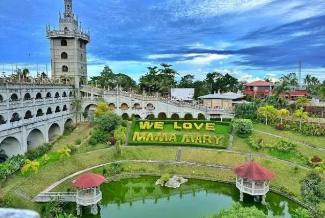 Majestic Simala Shrine in Sibonga, Cebu, featuring its castle-like architecture and surrounding greenery.