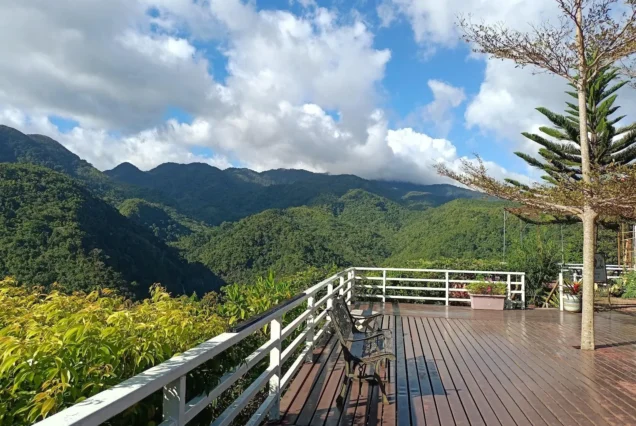 Scenic view of Jomax Peak in Don Salvador Benedicto, Negros Occidental, surrounded by lush mountains and countryside landscapes.
