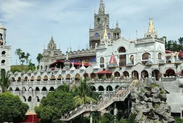 Simala Shrine in Sibonga, Cebu, showcasing its grand castle-like structure and scenic surroundings.