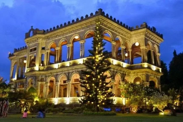 The Ruins in Talisay, Negros Occidental, featuring the grand remains of a historic mansion surrounded by gardens.
