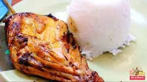 Grilled chicken served with rice at Mang Inasal in Bacolod City, Philippines.