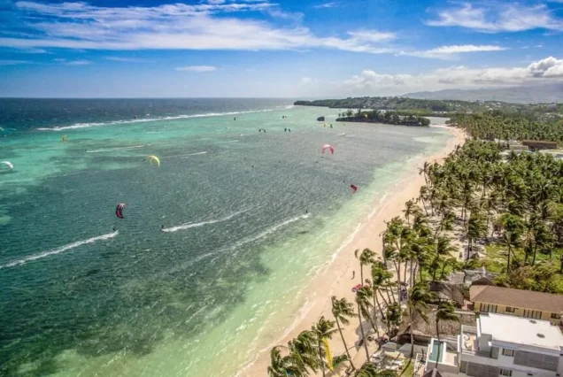 Scenic view of Boracay Island featuring white sand, turquoise waters, and tropical beach scenery.